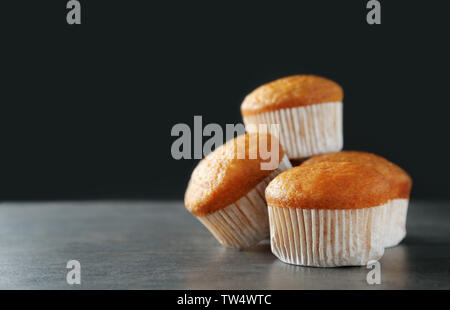 Delicious carrot muffins on dark background Stock Photo