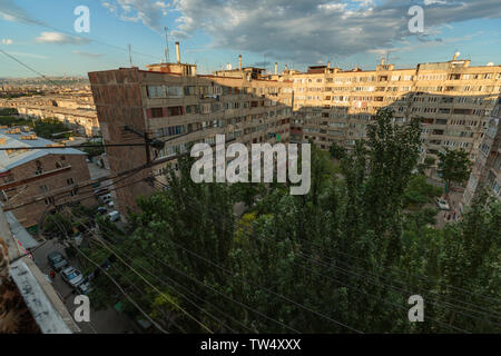 multi storey houses against the blue sky and white clouds Stock Photo ...