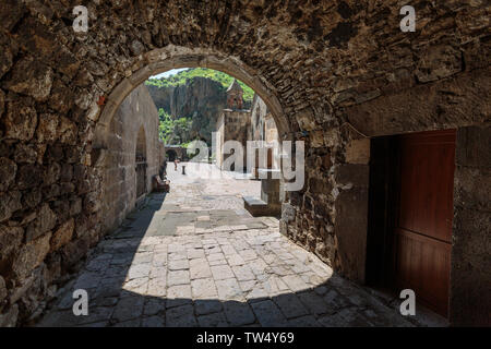 stone passage in armenia made in the form of an arch Stock Photo