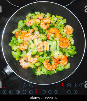 Closeup of thai, chinese traditional healthy food stir-fried broccoli with shrimps or prawns. Stock Photo