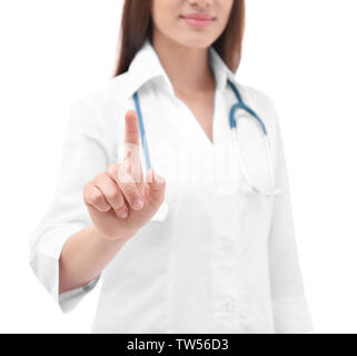 Young doctor using virtual screen, on white background Stock Photo