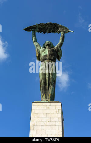 BUDAPEST, HUNGARY - MARCH 2018: The Liberty Statue or Freedom Statue stands on Gellert Hill above the city of Budapest. Stock Photo