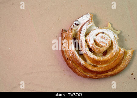 Buns with raisins on wood texture background. Stock Photo