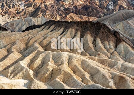 Zabriskie Point Part of the Death Valley National Park system in California which holds the record for the hottest recorded temperature in the world. Stock Photo