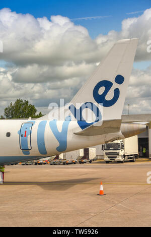 CARDIFF WALES AIRPORT - JUNE 2019: Airline logo on the tail of a Flybe Embraer E175 jet at Cardiff. Stock Photo