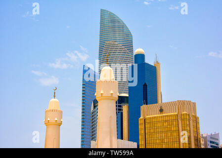 Mosque with modern high rises in downtown, Abu Dhabi, United Arab Emirates Stock Photo