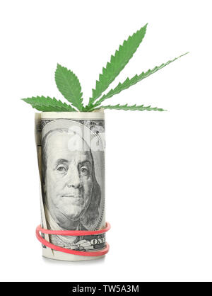 Green cannabis leaf and dollar on white background. Marijuana business concept Stock Photo