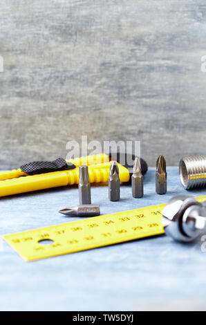 Hand tools on a wooden background. Close up. Stock Photo