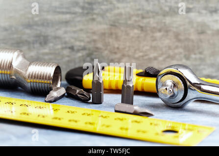 Hand tools on a wooden background. Close up. Stock Photo