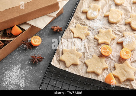 Christmas composition with raw cookies on grey background Stock Photo