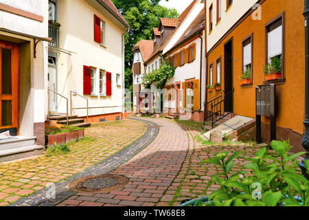 Narrow street in the old town of Amorbach in Lower Franconia, Bavaria, Germany Stock Photo
