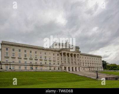 Full length exterior of the Stormont assembly building in Belfast Northern Ireland. Left-hand side view of Stormont front elevation with steps to lawn. Stock Photo