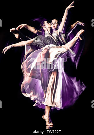 one caucasian woman modern ballet dancer dancing woman studio shot isolated on black bacground Stock Photo