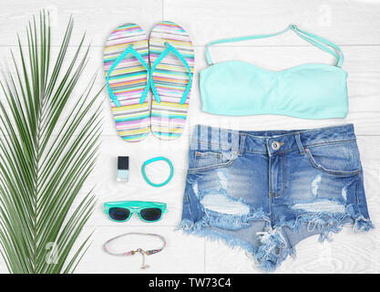 Composition with mint clothes and accessories on light background Stock Photo