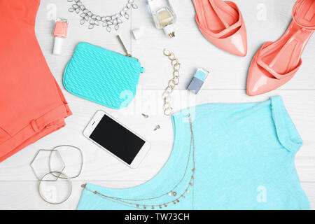 Composition with mint clothes and accessories on light background Stock Photo