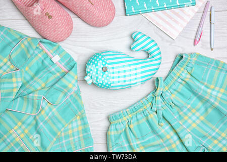 Composition with mint clothes and accessories on light background Stock Photo