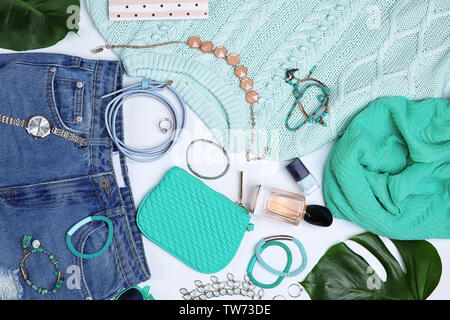 Composition with clothes and accessories on white background Stock Photo