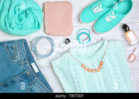 Composition with mint clothes and accessories on light background Stock Photo