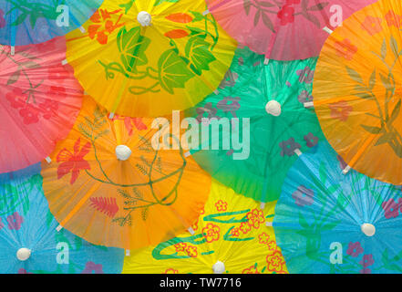 Colorful Cocktail Drink Umbrellas Top View Background. Stock Photo