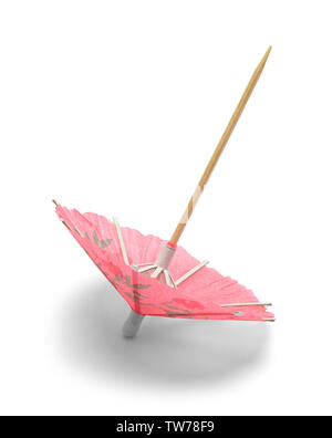 Pink Cocktail Umbrella Tipped Over Isolated on White. Stock Photo