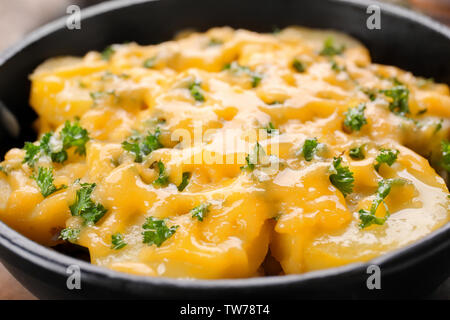 Delicious potato casserole in frying pan, closeup Stock Photo