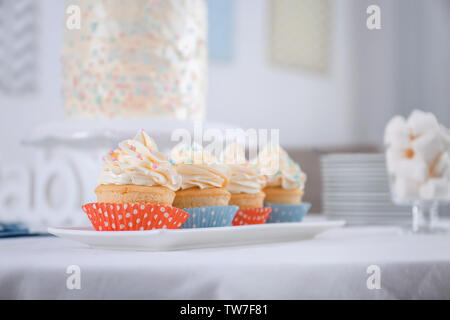 Delicious cupcakes on table, closeup Stock Photo