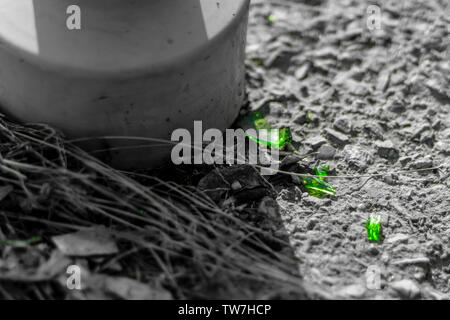 closeup shoot of broken glass pieces on stone floor. photo has taken at izmir/turkey. Stock Photo