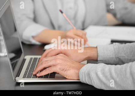 Manager working with laptop in office Stock Photo