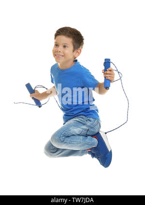 Cute boy skipping rope on white background Stock Photo