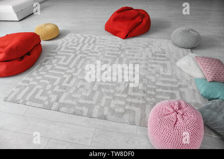 Poufs in room prepared for group psychotherapy session Stock Photo