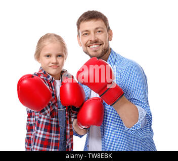 Cute little girl and her father in boxing gloves on white background Stock Photo