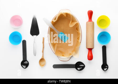 Kitchen utensils for pastries on white background Stock Photo