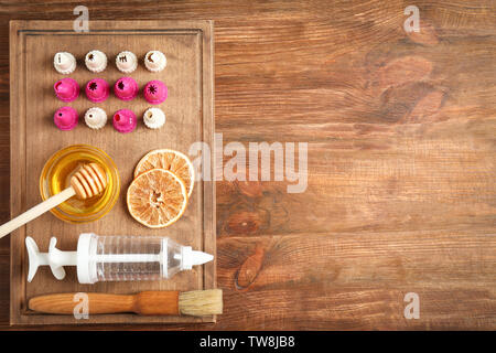 Kitchen utensils and ingredients for pastries on wooden background Stock Photo