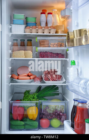 Refrigerator with many different products Stock Photo