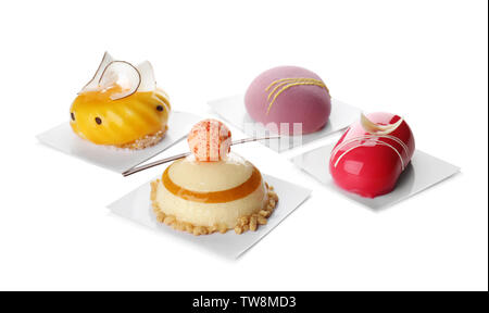 Various tasty cakes on white background Stock Photo