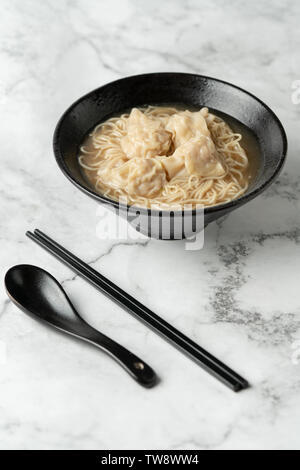 Cloud noodles on a marble table. Stock Photo