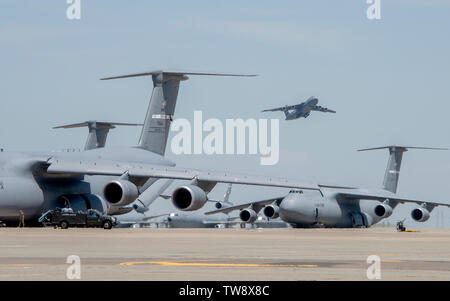 A C-5M Super Galaxy aircraft takes off from Dover Air Force Base ...