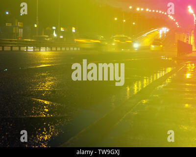 Blurred background. Night city lights blur. Retro toned photo, vintage. Stock Photo