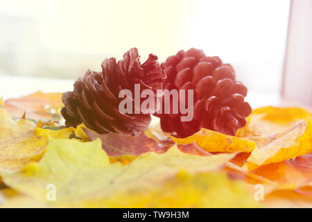 two bumps on autumn leaves, space for text Stock Photo