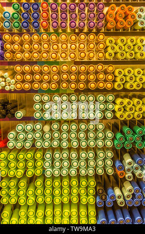 several color pens stack row in stationary shop store background Stock Photo