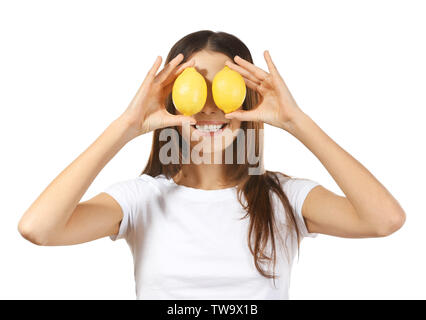 Beautiful young woman with ripe lemons on white background Stock Photo