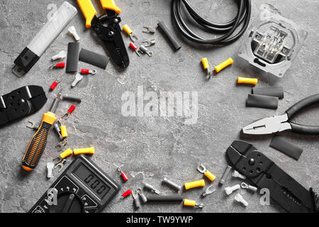 Different electrical tools on grey background Stock Photo