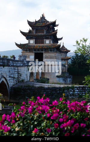 Old chinese bridge. The ancient Shuanglong Bridge (Seventeen Span Bridge) near Jianshui, Yunnan, China Stock Photo