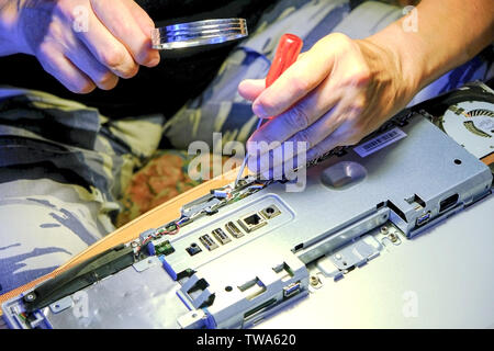 Electronic engineer of computer technology. Maintenance computer cpu hardware upgrade of motherboard component. Pc repair, technician and industry sup Stock Photo