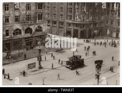 First Red Army tank T-34 arrives to Wenceslas Square (Václavské náměstí) in Prague, Czechoslovakia, in the morning on 9 May 1945. Black and white photograph by an unknown photographer published in the Czechoslovak vintage postcard issued in 1955. Courtesy of the Azoor Postcard Collection. Stock Photo