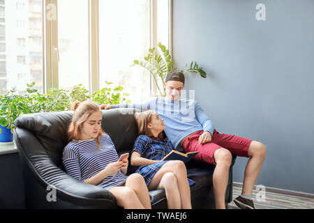 Students resting together in campus building Stock Photo
