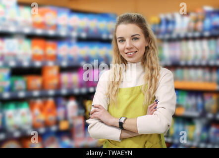 Portrait of young woman in shop. Small business owner Stock Photo