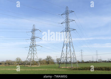 National Grid electricity pylons and overhead power lines cross countryside in rural Buckinghamshire, England, UK Stock Photo