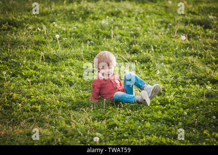 Cute little boy at summer day playing and smiling  Stock Photo