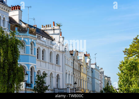 Colourful English Victorian Houses in Notting Hill, a district in West London in the Borough of Kensington and Chelsea Stock Photo